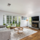 Annandale Behavioral Health living room with fireplace and big screen TV