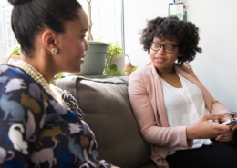 family member and counselor talking during a family support session