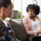 family member and counselor talking during a family support session