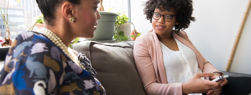 family member and counselor talking during a family support session