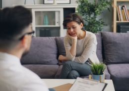 therapist meeting with a client to discuss treating OCD and addiction together