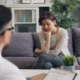 therapist meeting with a client to discuss treating OCD and addiction together