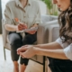 Clinician in a Los Angeles residential treatment office listening to a patient describe depression and cocaine use during a dual diagnosis assessment