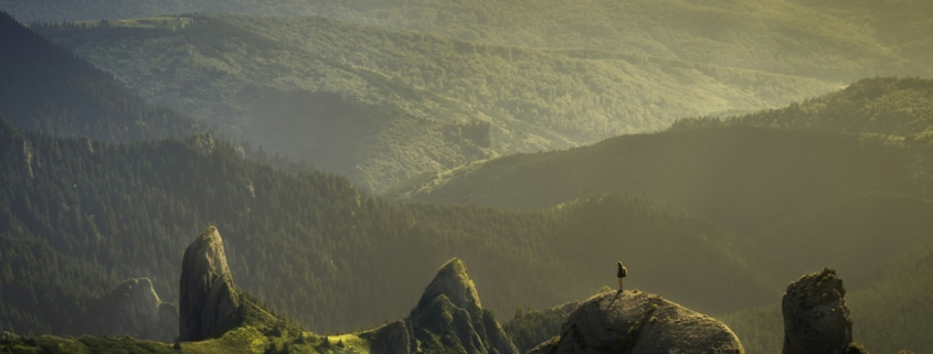 Sunrise breaking over mountains, symbolizing hope and healing in early addiction recovery