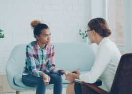 A supportive conversation in a calm clinical setting