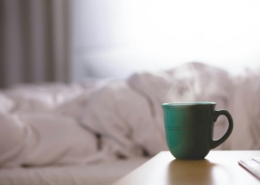 Calm morning mug on a wooden surface representing the steadier days after medical alcohol detox