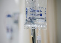 IV drip stand in a hospital room representing medical detox care