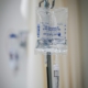 IV drip stand in a hospital room representing medical detox care