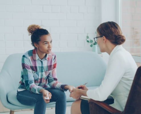 Family member learning what to do when a loved one refuses residential rehab during a counseling conversation
