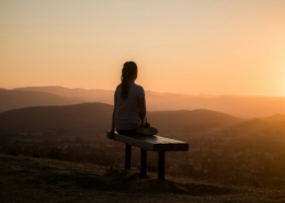 Person overlooking mountains during post-acute withdrawal recovery