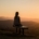 Person overlooking mountains during post-acute withdrawal recovery