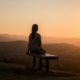 Person overlooking mountains during post-acute withdrawal recovery