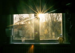 Quiet morning light through a window, representing the moment a family recognizes that outpatient addiction care is no longer enough
